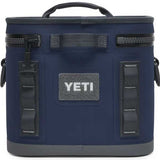 Yeti Hopper Flip 8 Personal Cooler - A navy blue cooler with a handle on top and two zippered compartments, one on each side.