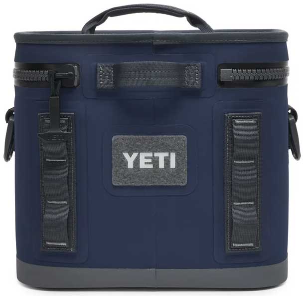 Yeti Hopper Flip 8 Personal Cooler - A navy blue cooler with a handle on top and two zippered compartments, one on each side.