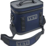 Yeti Hopper Flip 8 Personal Cooler - A navy blue cooler with a zippered lid and two handles, featuring a gray logo on one side.