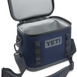Yeti Hopper Flip 8 Personal Cooler - A navy blue cooler with a zippered lid and two handles, one on each side.