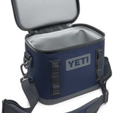 Yeti Hopper Flip 8 Personal Cooler - A navy blue cooler with a zippered lid and two handles, one on each side.