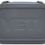 Yeti Hopper Flip 8 Personal Cooler - A gray cooler with a handle on top and a zipper closure, featuring the word "YETI" embossed in the center.