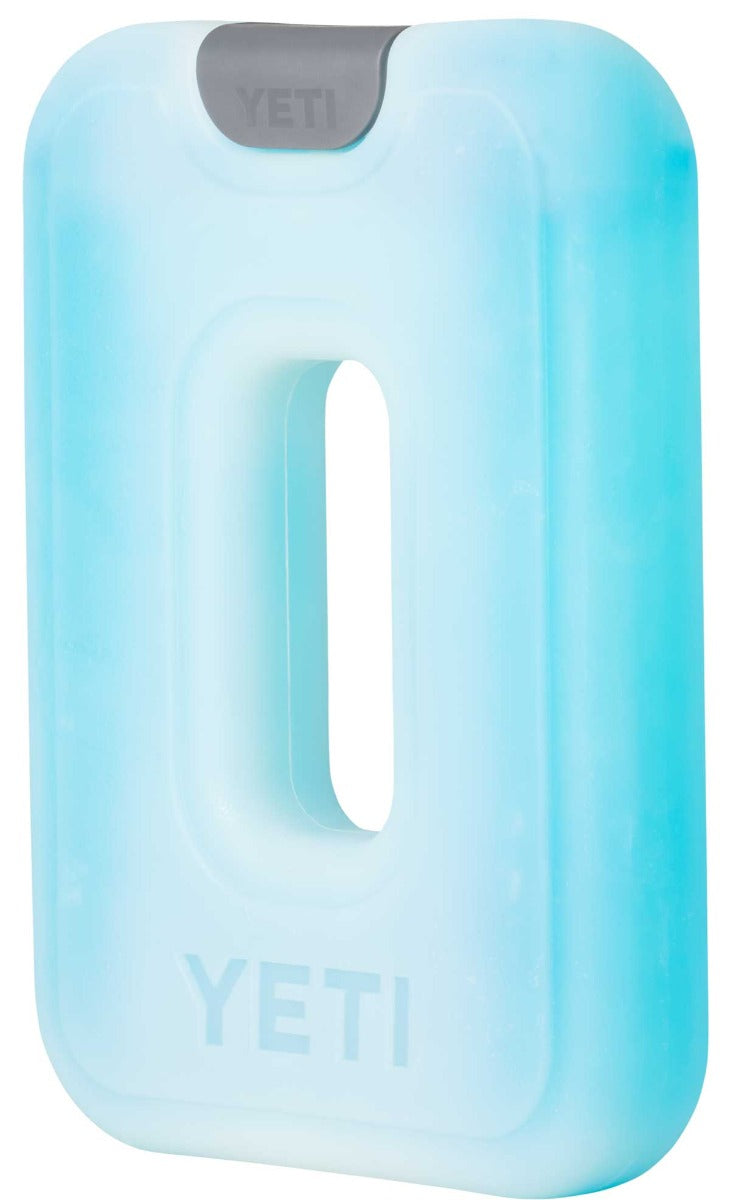 Yeti Thin Ice Medium - A light blue ice pack with a gray tab at the top, featuring the word "YETI" embossed on it.