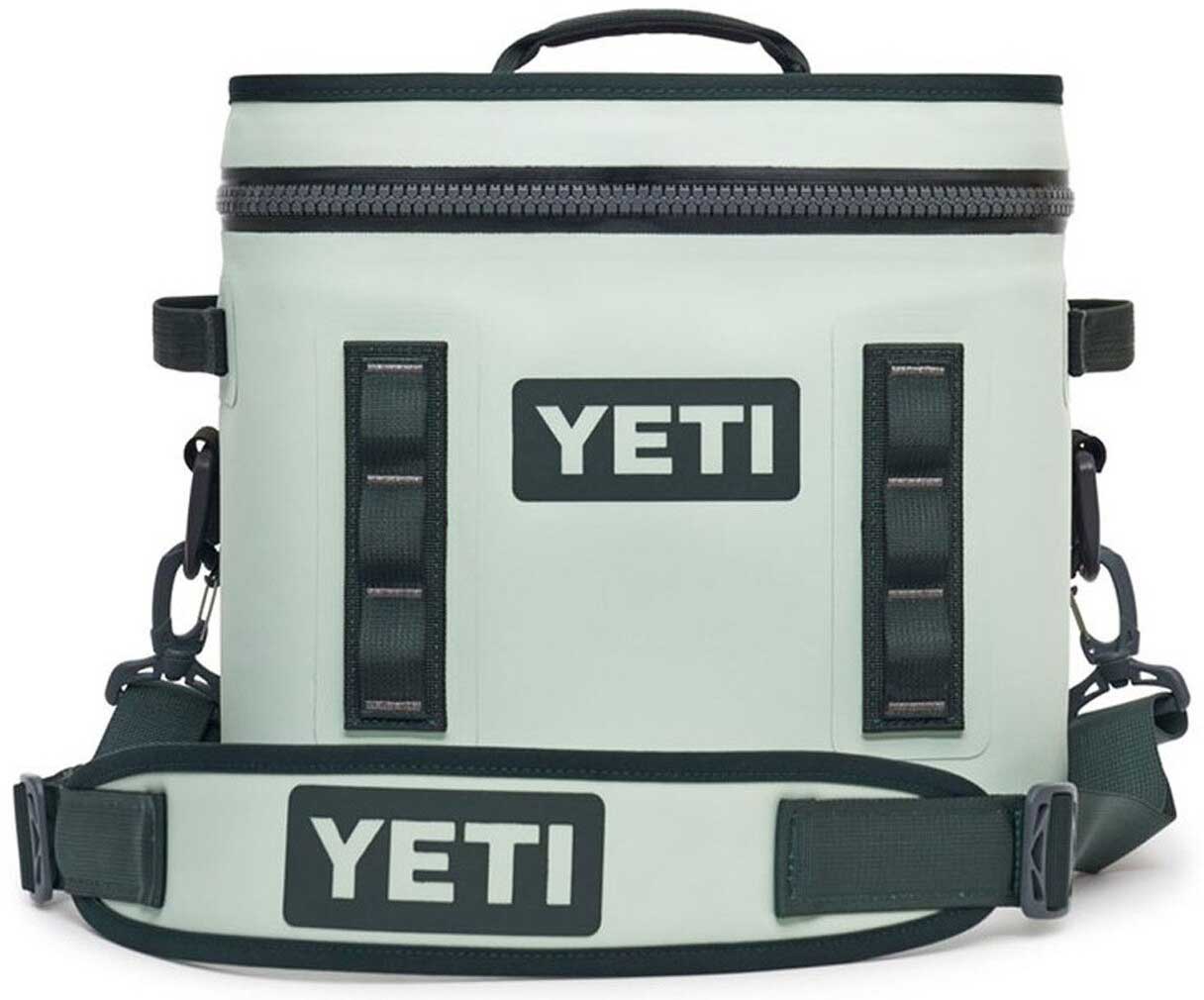 Yeti Hopper Flip 12 Personal Cooler - A light blue cooler with a zipper closure and two handles on top.