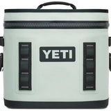 Yeti Hopper Flip 12 Personal Cooler - A light gray cooler with a zipper closure and two handles on either side, featuring a rectangular shape and a small handle at the top.