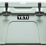 Yeti Tundra 35 Hard Cooler - A large, rectangular cooler with a dark gray lid and matching body, featuring two black latches on top.