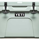 Yeti Tundra 35 Hard Cooler - A large, rectangular cooler with a dark gray lid and matching body, featuring two black latches on top.