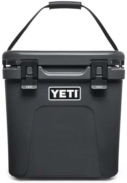 Yeti Roadie 24 Hard Cooler - A black cooler with a handle on top and two latches in front.