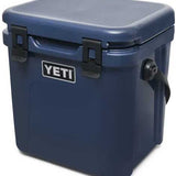 Yeti Roadie 24 Hard Cooler - A dark gray, rectangular cooler with a handle on top and a small logo in the center.