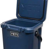 Yeti Roadie 24 Hard Cooler - A navy blue cooler with a black handle and latch on top, viewed from the front at an angle.