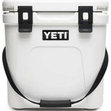 Yeti Roadie 24 Hard Cooler - A white, rectangular cooler with a handle on top and a latch in the middle.