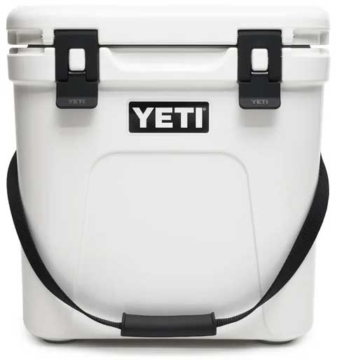 Yeti Roadie 24 Hard Cooler - A white, rectangular cooler with a handle on top and a latch in the middle.