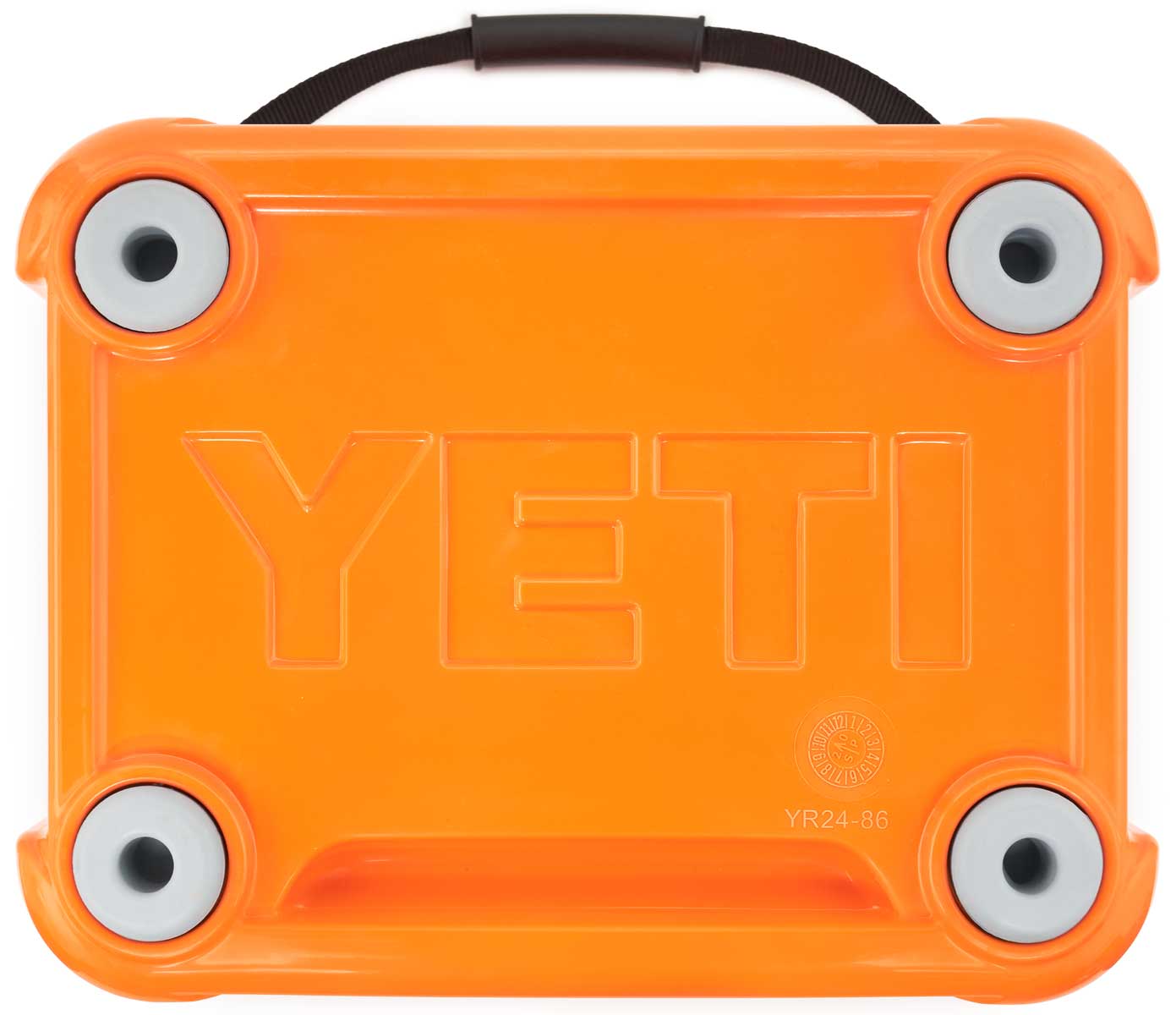 Yeti Roadie 24 Hard Cooler - A small, rectangular cooler with a handle on top and an embossed logo that reads "YETI" in all capital letters.
