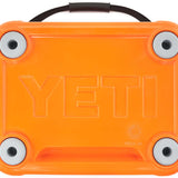 Yeti Roadie 24 Hard Cooler - A small, rectangular cooler with a handle on top and an embossed logo that reads "YETI" in all capital letters.