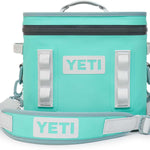 Yeti Hopper Flip 12 Personal Cooler - A light blue cooler with a zipper closure and two handles on top.