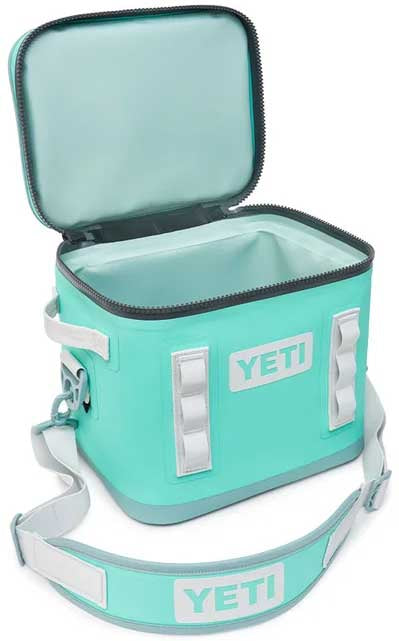 Yeti Hopper Flip 12 Personal Cooler - A mint green cooler with a zippered lid and two gray handles on either side.