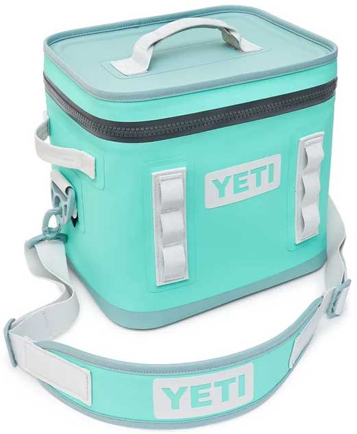 Yeti Hopper Flip 12 Personal Cooler - A mint green cooler with a zippered top and two white handles on either side.
