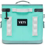 Yeti Hopper Flip 12 Personal Cooler - A mint green cooler with a black zipper and handle on top.
