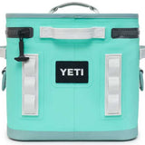Yeti Hopper Flip 12 Personal Cooler - A mint green cooler with a black zipper and handle on top.