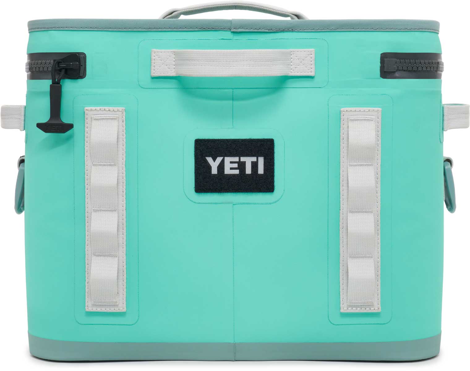 Yeti Hopper Flip 18 Personal Cooler - A mint green cooler with a handle on top and an ice pack visible inside.