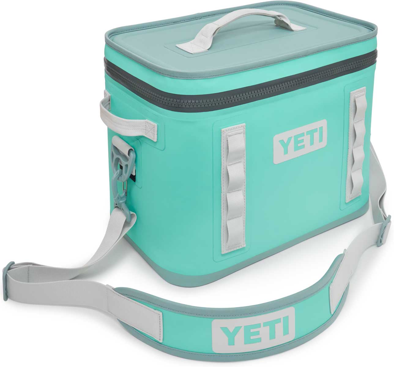 Yeti Hopper Flip 18 Personal Cooler - A mint green cooler with a zippered lid and two handles, one on each side.