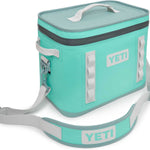 Yeti Hopper Flip 18 Personal Cooler - A mint green cooler with a zippered lid and two handles, one on each side.