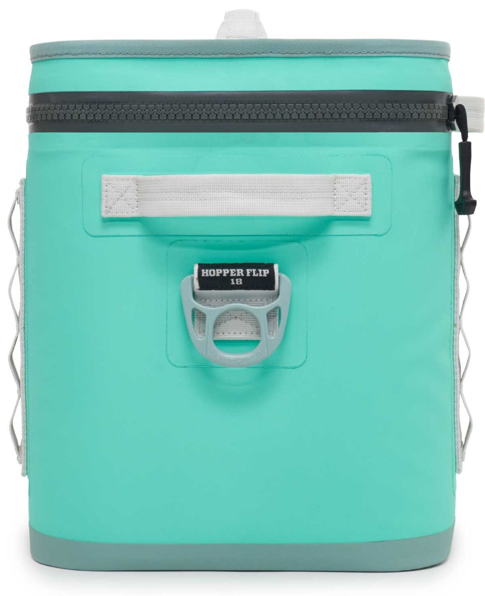 Yeti Hopper Flip 18 Personal Cooler - A mint green cooler with a zippered top and handle on the side, featuring a black zipper pull tab.