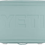 Yeti Hopper Flip 18 Personal Cooler - A cooler with a dark gray lid and a light gray body, featuring a handle on top and a zipper closure at the front.