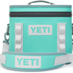 Yeti Hopper Flip 8 Personal Cooler - A mint green cooler with a zippered top and two handles, one on each side.