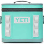 Yeti Hopper Flip 8 Personal Cooler - A mint green cooler with a zippered top and two white handles on either side.