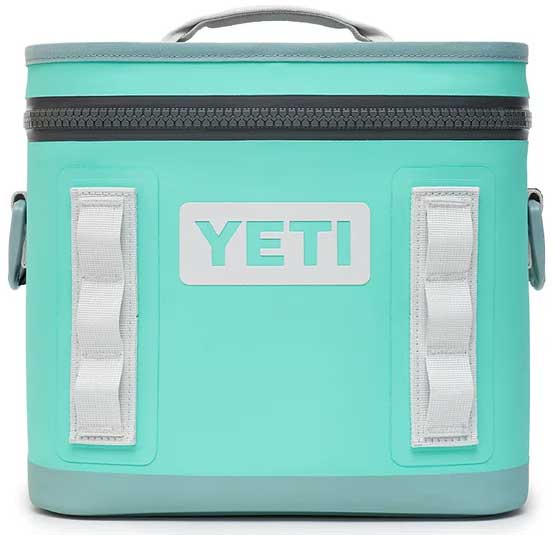 Yeti Hopper Flip 8 Personal Cooler - A mint green cooler with a zippered top and two white handles on either side.