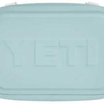 Yeti Hopper Flip 8 Personal Cooler - A light blue cooler with a handle on top and a zipper closure at the front.