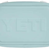 Yeti Hopper Flip 8 Personal Cooler - A light blue cooler with a handle on top and a zipper closure at the front.