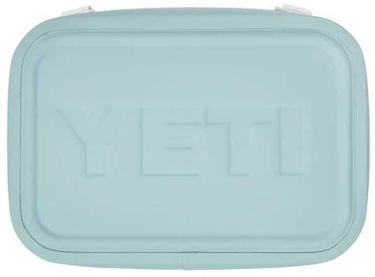 Yeti Hopper Flip 8 Personal Cooler - A light blue cooler with a handle on top and a zipper closure at the front.