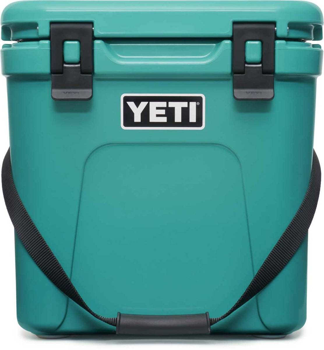 Yeti Roadie 24 Hard Cooler - A compact, portable cooler with a sleek design and a silver handle on top.