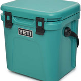 Yeti Roadie 24 Hard Cooler - A compact, portable cooler with a stainless steel handle and rubberized grip on top.