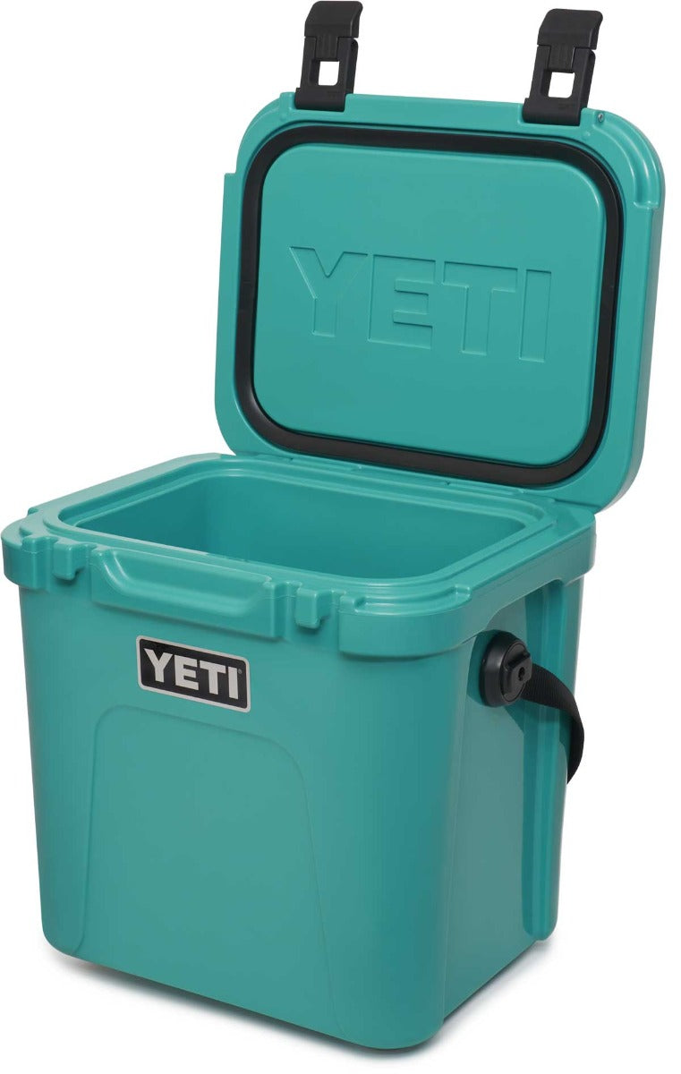 Yeti Roadie 24 Hard Cooler - A compact, portable cooler with a stainless steel handle and rubberized grip on top.