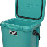 Yeti Roadie 24 Hard Cooler - A compact, portable cooler with a stainless steel handle and rubberized grip on top.