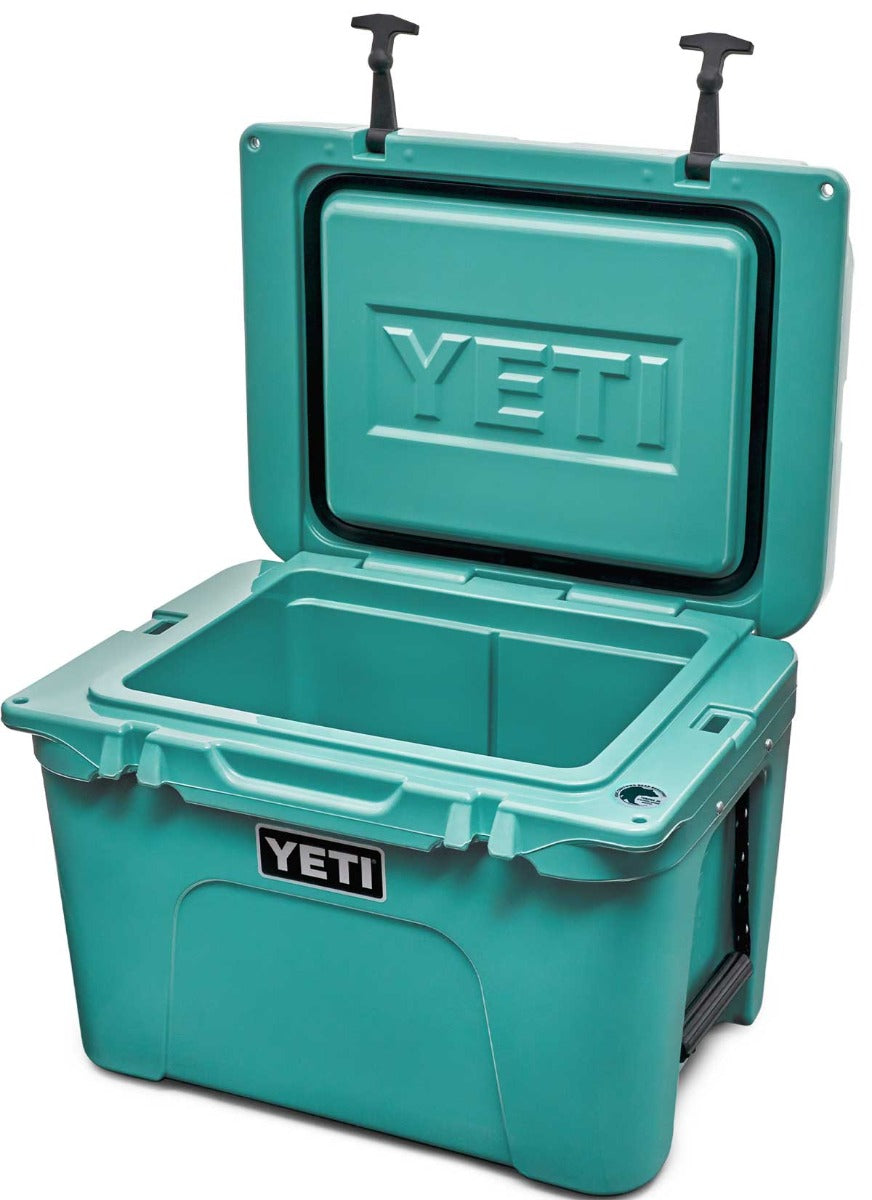 Yeti Tundra 35 Hard Cooler - A large, rectangular cooler with a dark gray lid and matching body, featuring a prominent "YETI" logo on the front in white lettering.