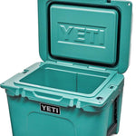 Yeti Tundra 35 Hard Cooler - A large, rectangular cooler with a dark gray lid and matching body, featuring a prominent "YETI" logo on the front in white lettering.