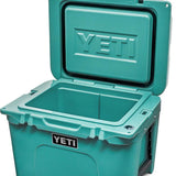 Yeti Tundra 35 Hard Cooler - A large, rectangular cooler with a dark gray lid and matching body, featuring a prominent "YETI" logo on the front in white lettering.