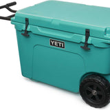 Yeti Tundra Haul Wheeled Cooler - A large, turquoise cooler with a handle and wheels on the bottom.