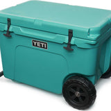 Yeti Tundra Haul Wheeled Cooler - A large, turquoise cooler with a handle and wheels on the bottom.