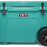 Yeti Tundra Haul Wheeled Cooler - A large, rectangular cooler with a built-in handle and wheels on one end. It has a dark gray lid and body with silver latches.