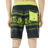 Oakley Men's Temples 19" Swim Board Shorts 2018 - Black swim trunks with a palm tree print and neon green accents.