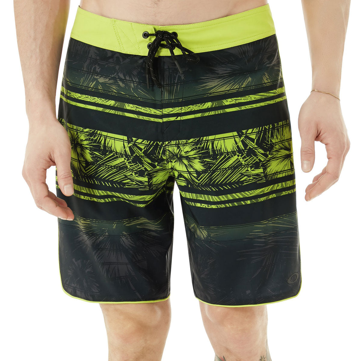 Oakley Men's Temples 19" Swim Board Shorts 2018 - Black swim trunks with a palm tree pattern and lime green accents.
