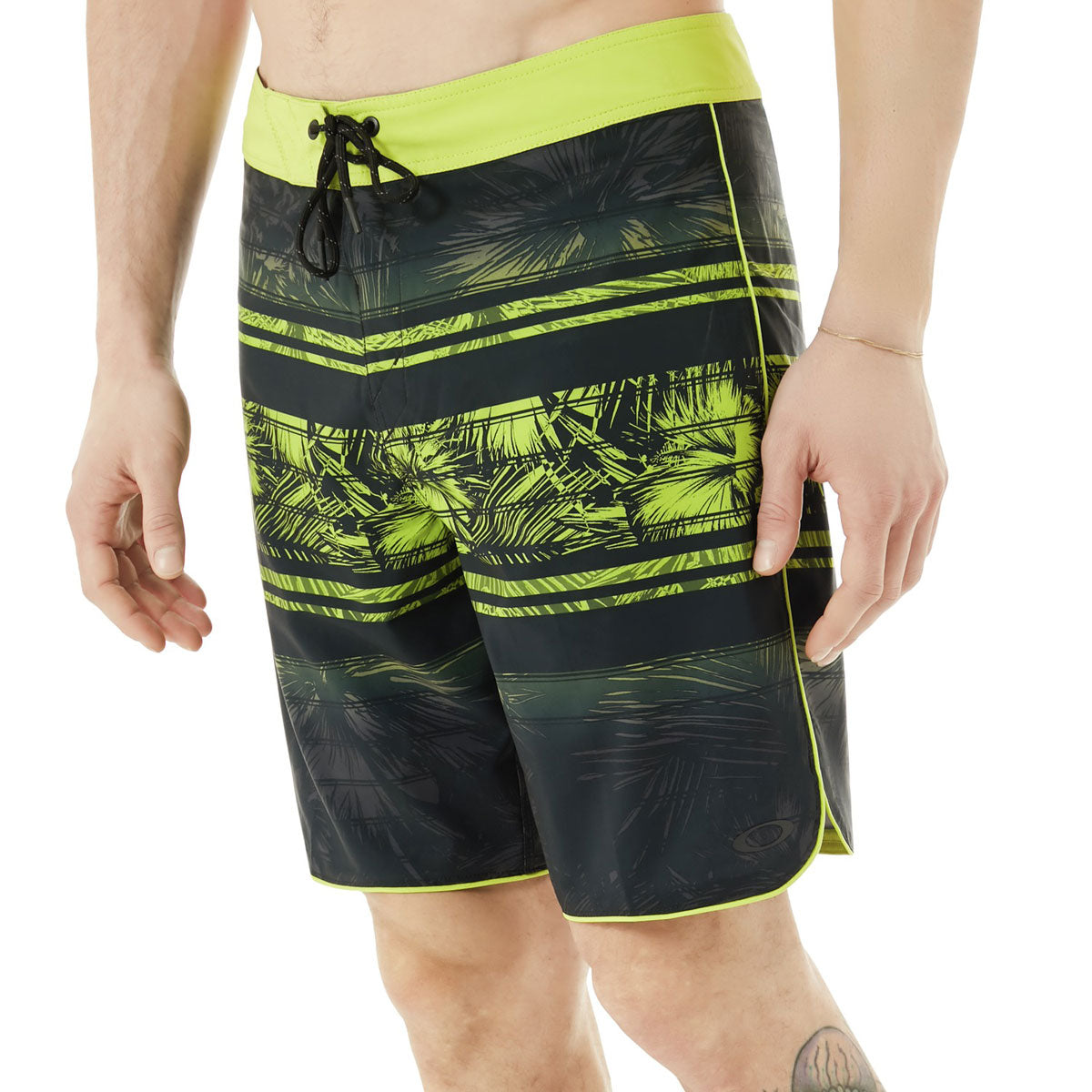 Oakley Men's Temples 19" Swim Board Shorts 2018 - Black swim trunks with a palm tree pattern and lime green accents.