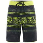Oakley Men's Temples 19" Swim Board Shorts 2018 - Black swim trunks with a palm tree pattern and lime green accents.