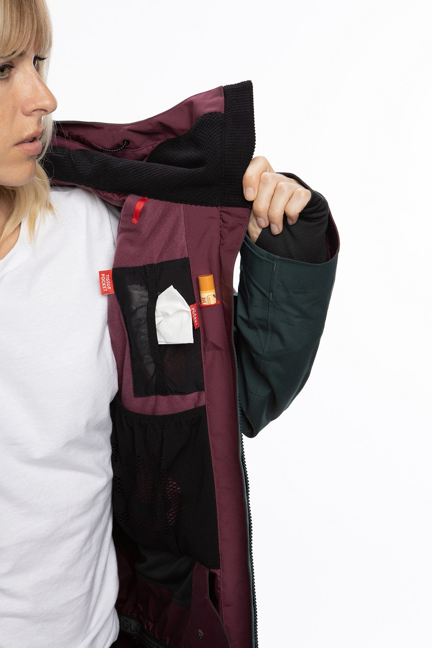 The 686 Ladies GLCR Mantra Insulated Jacket 2021 is plum-colored with a black BOA dial and an insulated hood.