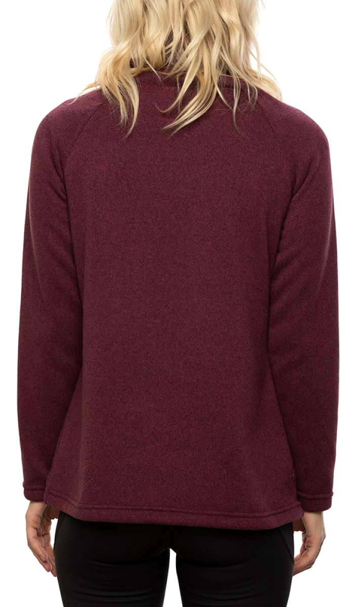 The 686 Women's Balance Pull-Over Fleece 2022 in burgundy features a relaxed fit with raglan sleeves and a crew neck.